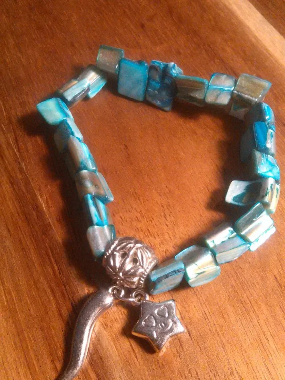Blue Shell and Silvertone Star Charm Stretch Bracelet